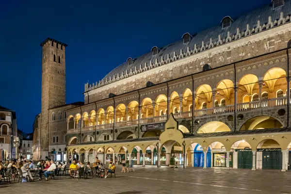 A stunning outdoor square in Padova with subtle lighting to accentuate the facade
