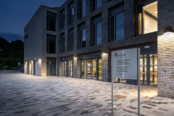 Outdoor walkway area of a University with subtle lighting for safety