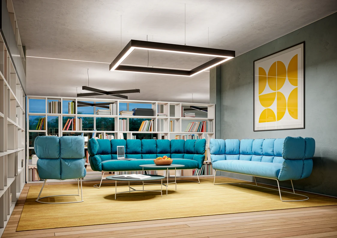 Le luminaire SLOTLIGHT infinity II éclaire un salon moderne avec une lumière homogène et sans éblouissement au-dessus d’un tapis.