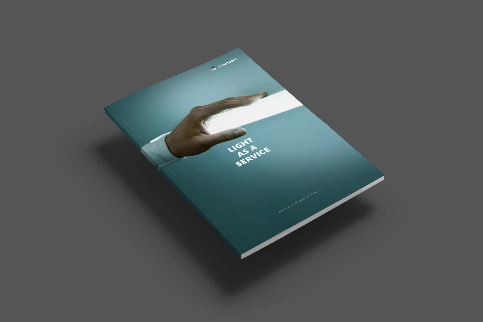 Eine Hand berührt eine Lichtlinie. 