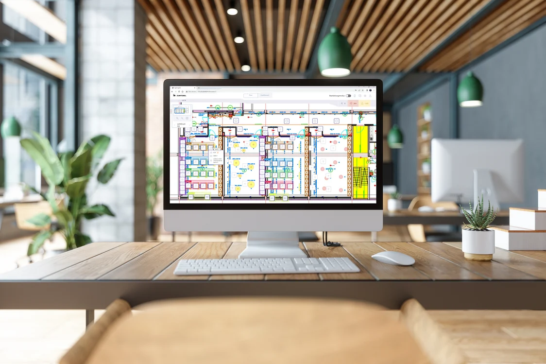 The LightingGO system displays the colour-coded layout of an office on a screen, highlighting different areas with distinct colours.