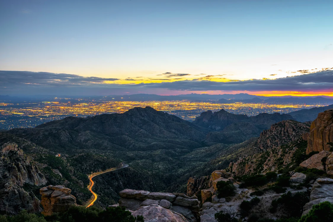 Illuminated cityscape at dusk, atmospheric play of light with Zumtobel lighting.