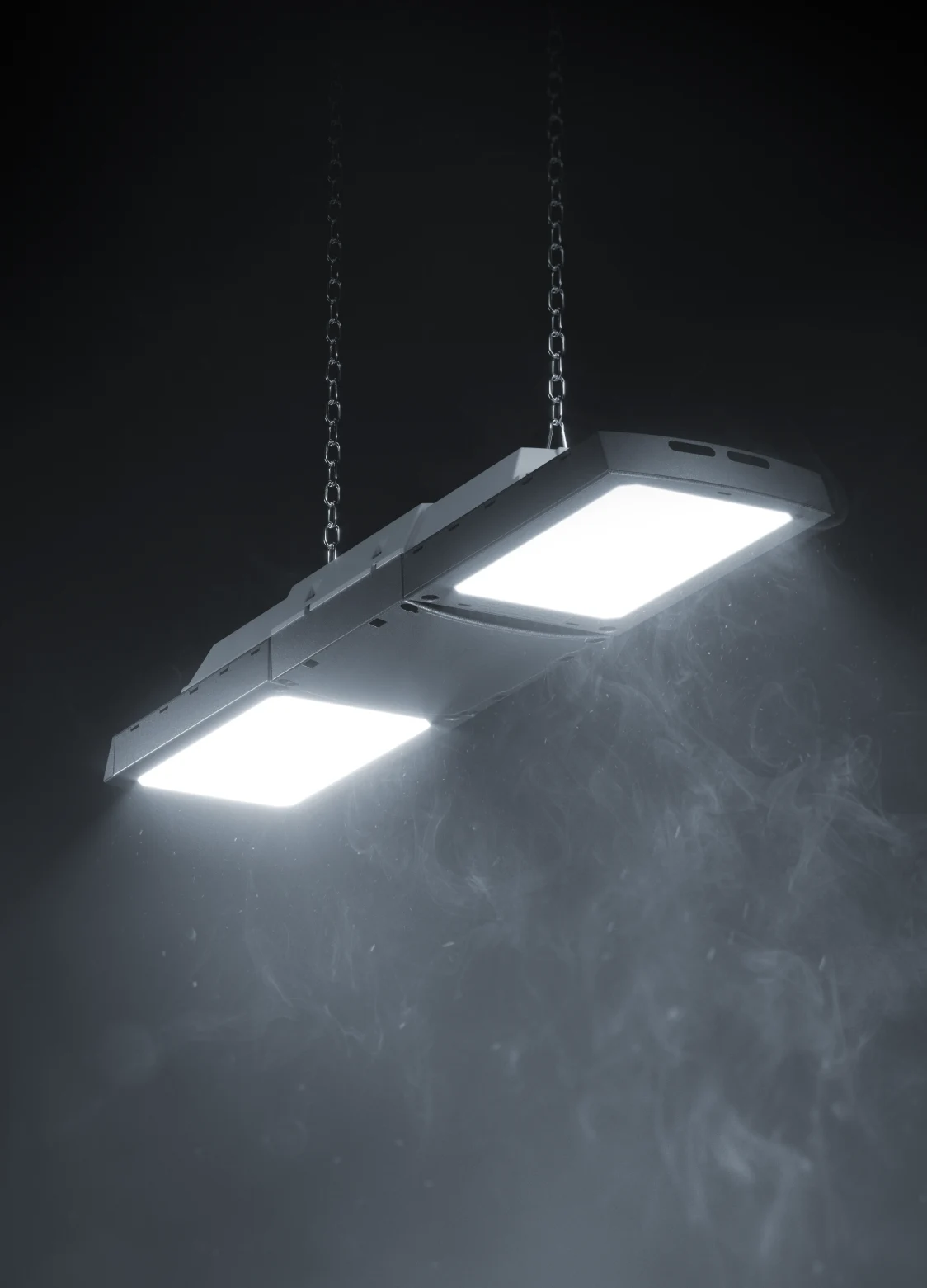  Il sistema di gestione della luce EXENEO è sospeso su catene e fornisce una luce intensa e senza abbagliamento in una stanza buia con nebbia diffusa.