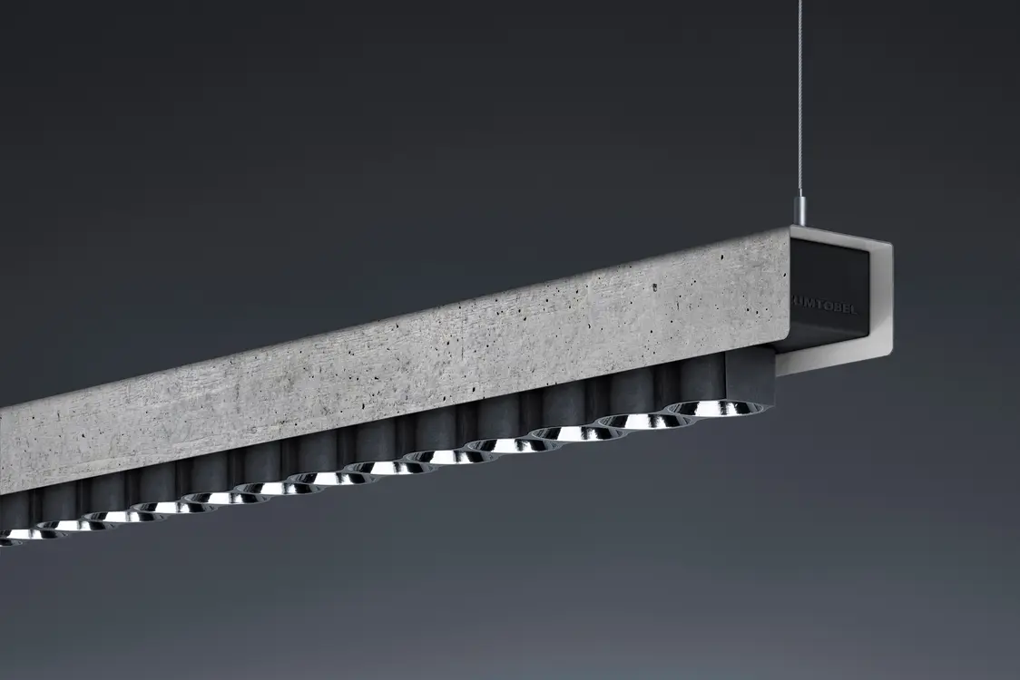 Il sistema di illuminazione IZURA di ZUMTOBEL offre una soluzione di design moderna e sospesa con emissione diretta di luce LED in stile minimalista.
