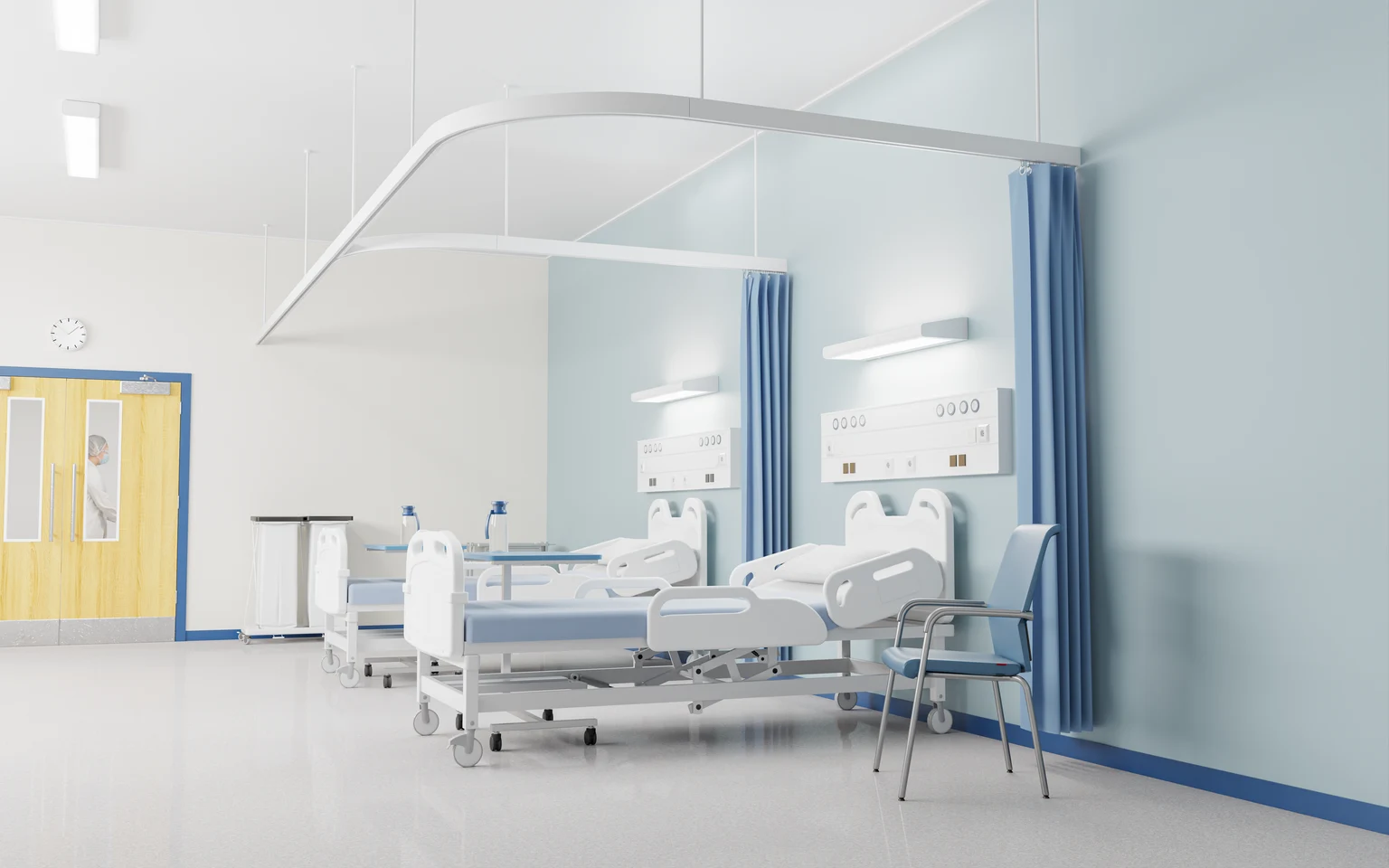 An empty ward with two beds ready for patients