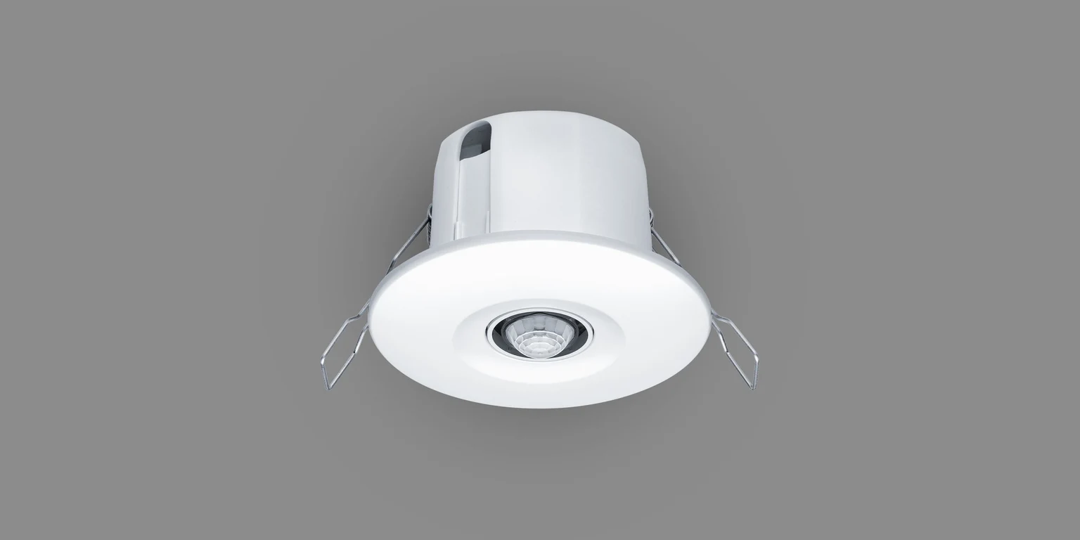 Ceiling-mounted motion and light sensor for smart room management by Zumtobel Lighting