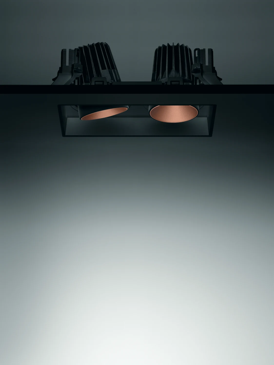 The DIAMO LED lighting system with dual luminaires offers precise, focused illumination in a minimalist black housing.