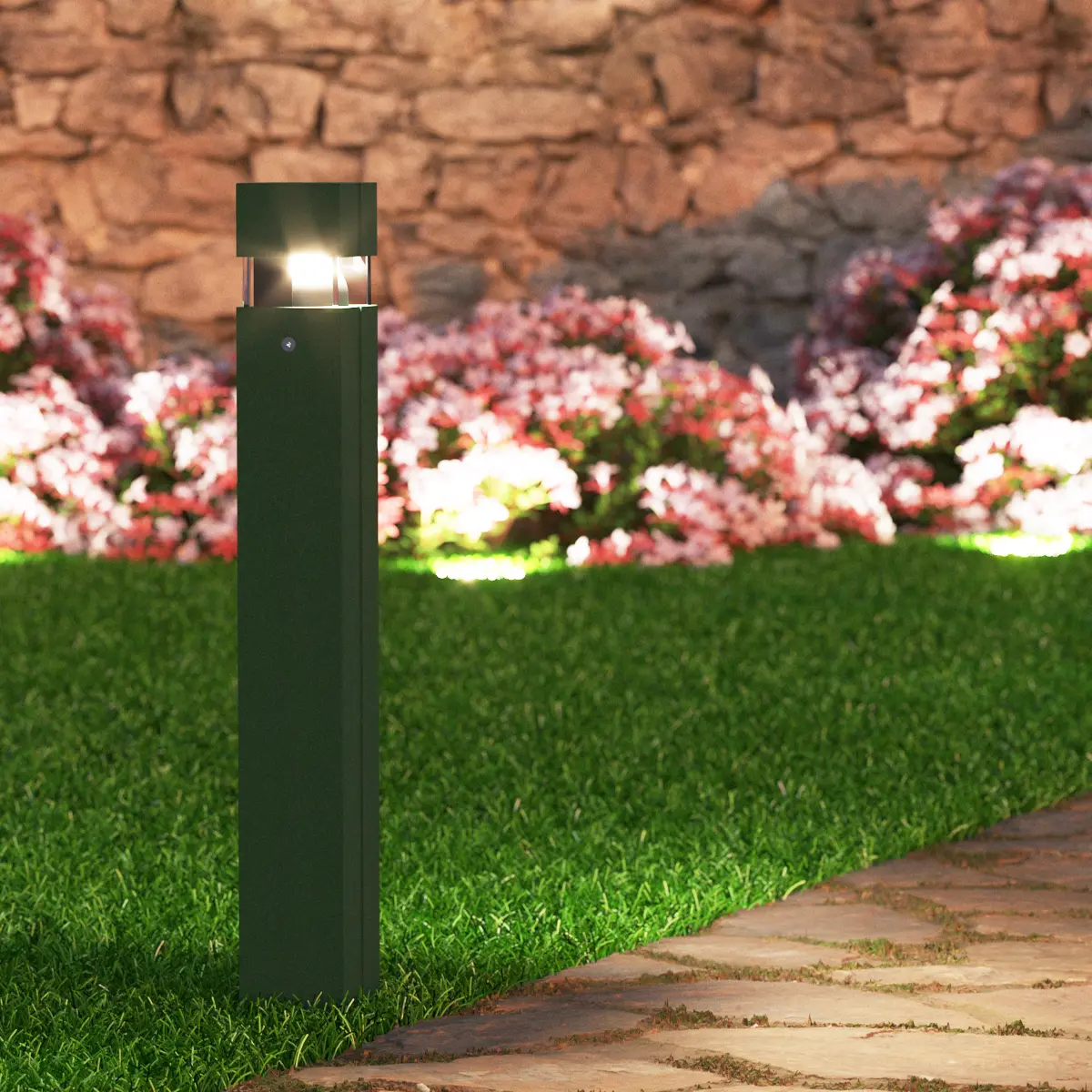 Outdoor Pollerleuchte Mini Quadro in einem beleuchteten Garten am Wegrand