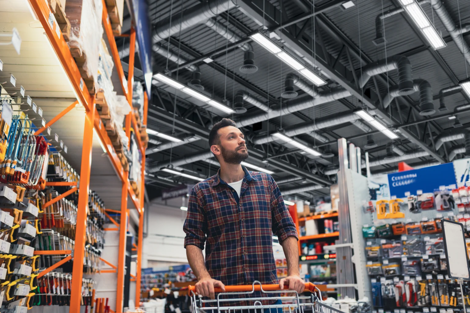 Large DIY store with high ceiling, the space is lit with Titus linear highbays