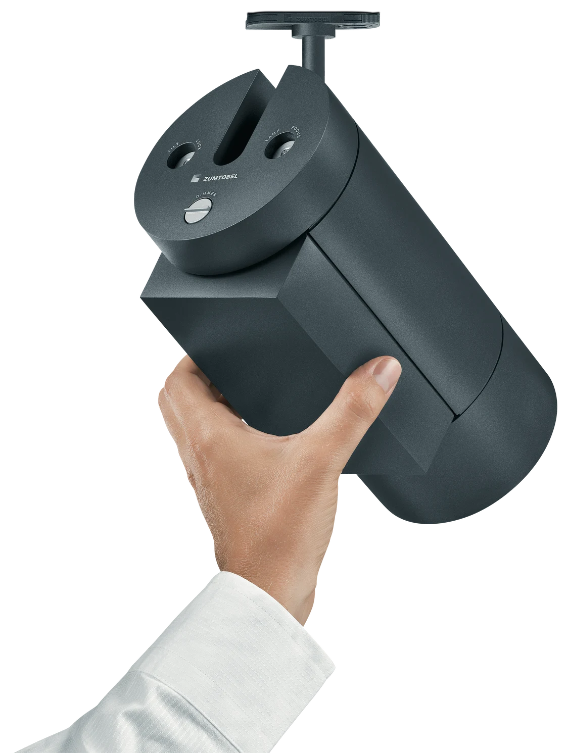 A hand holds the black ARCOS lighting system in a neutral space, impressing with its modern, cylindrical design.