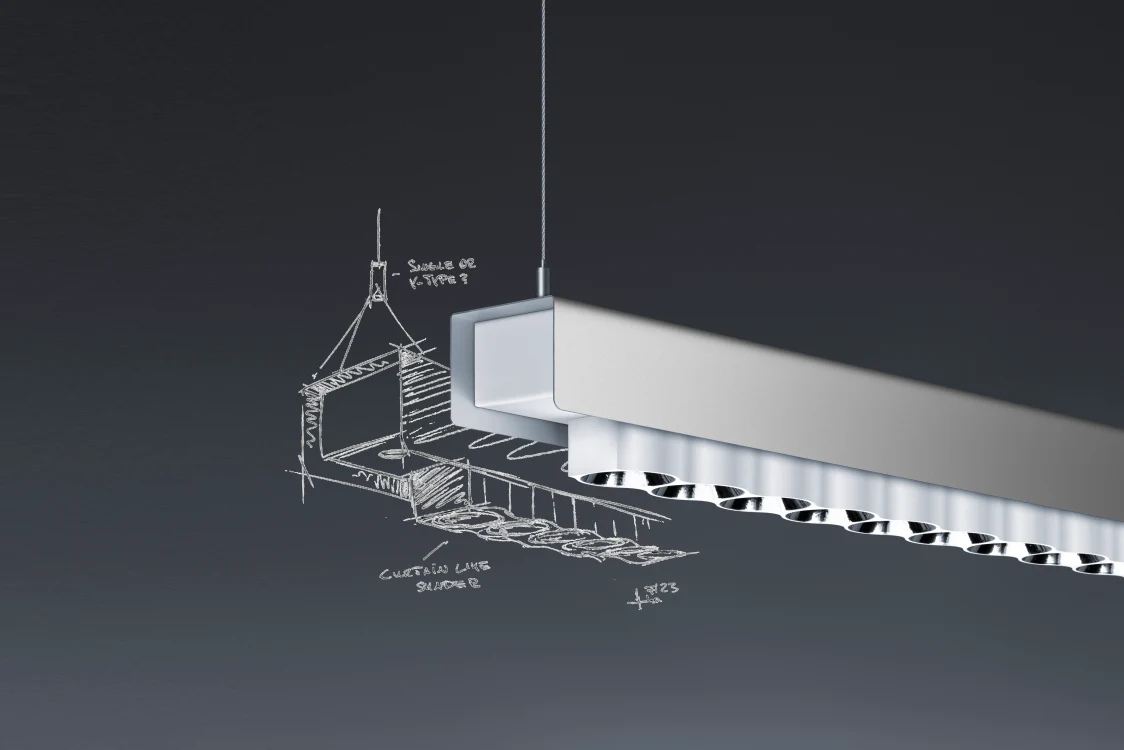 The new innovation, the IZURA pendant luminaire by Zumtobel, can be seen in a close-up.