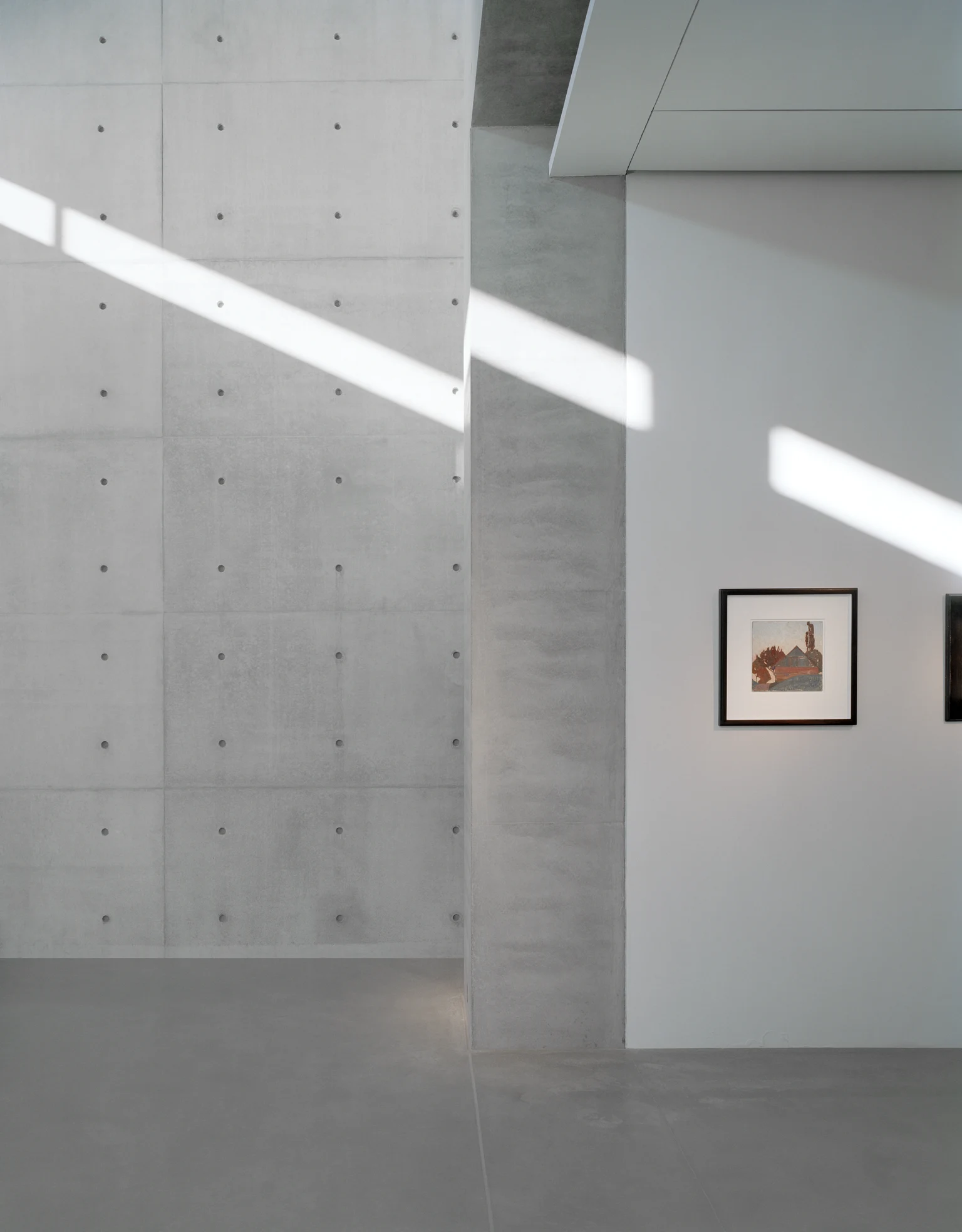 Wall passage in a modern building constructed of concrete.