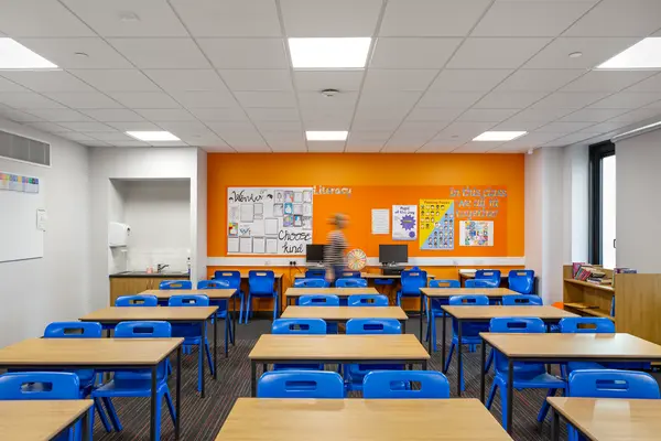 Riverbank School in Glasgow, an empty classroom with lighting panels in the ceiling