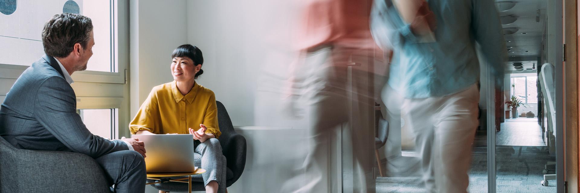 two-people-sitting-talking-motion