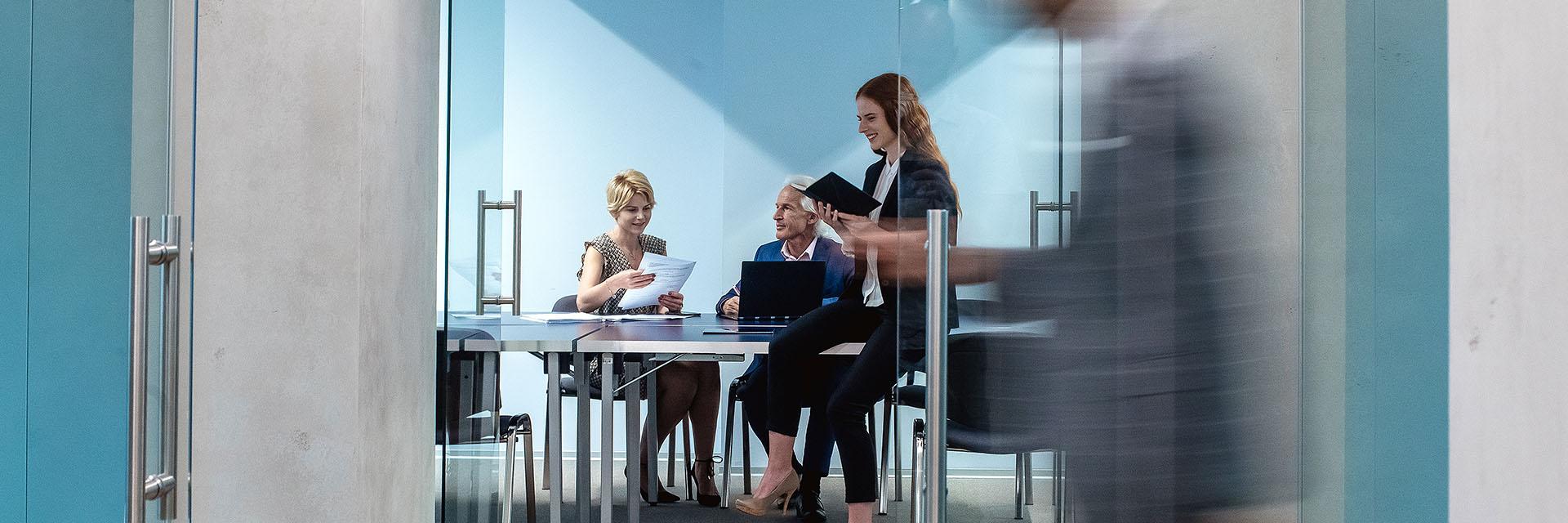 two-people-meeting-glass-door