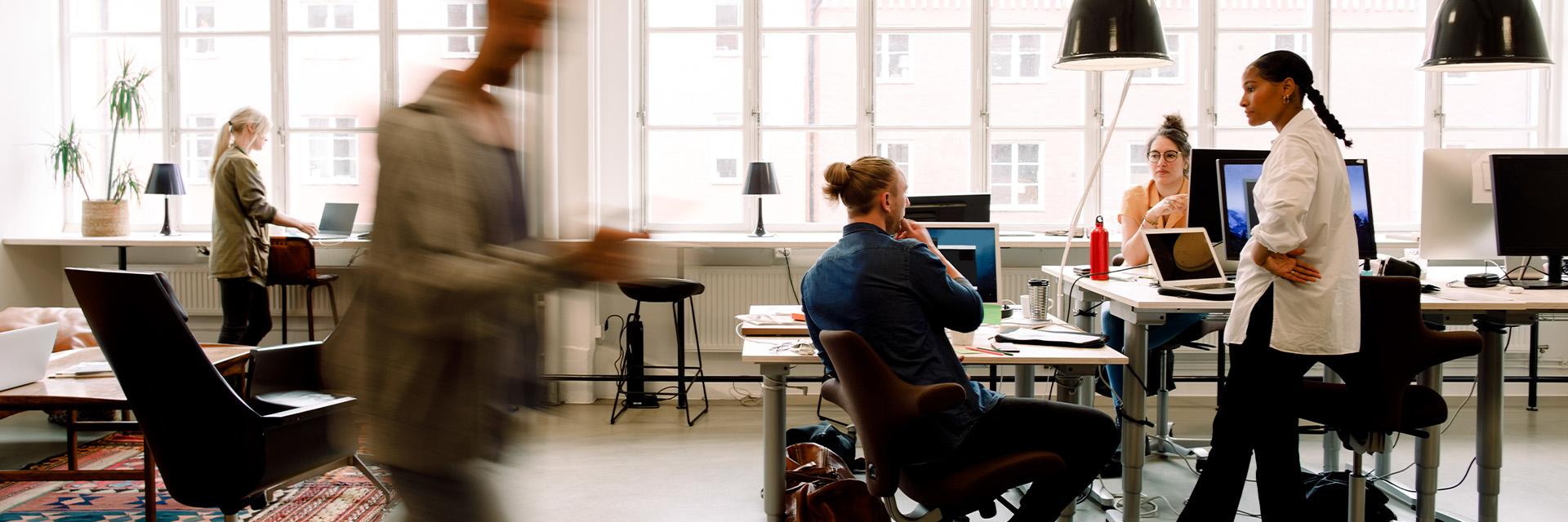 A team of people in a modern workspace