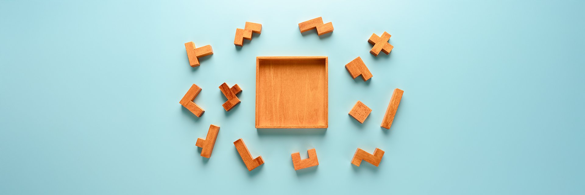 A block puzzle with pieces around it
