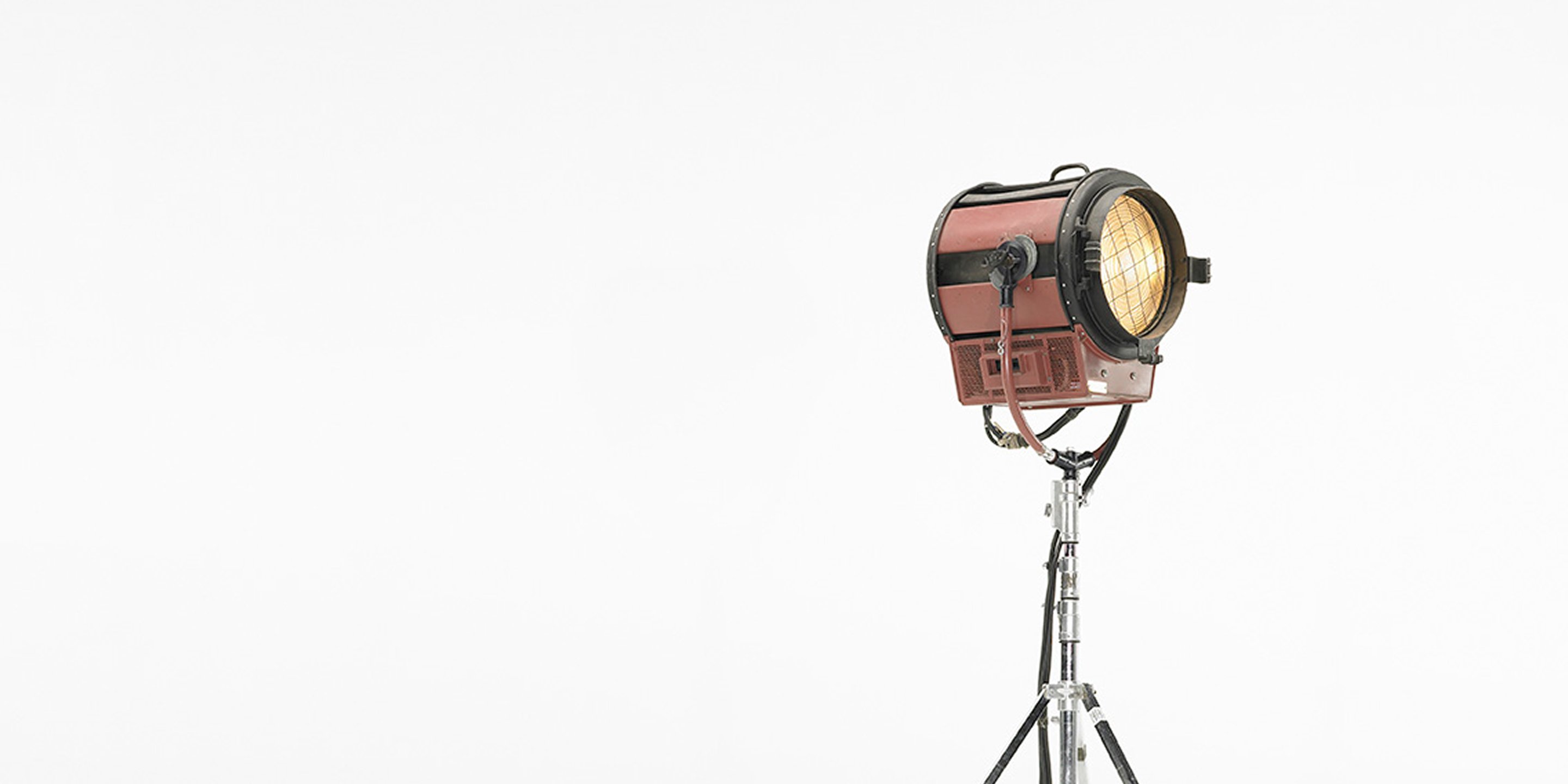 Colorful blocks tumbling on a pink background