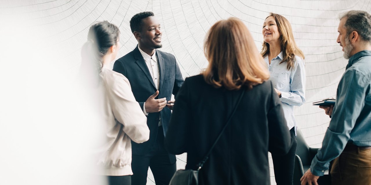 IFA_Co_CIO_group_talking