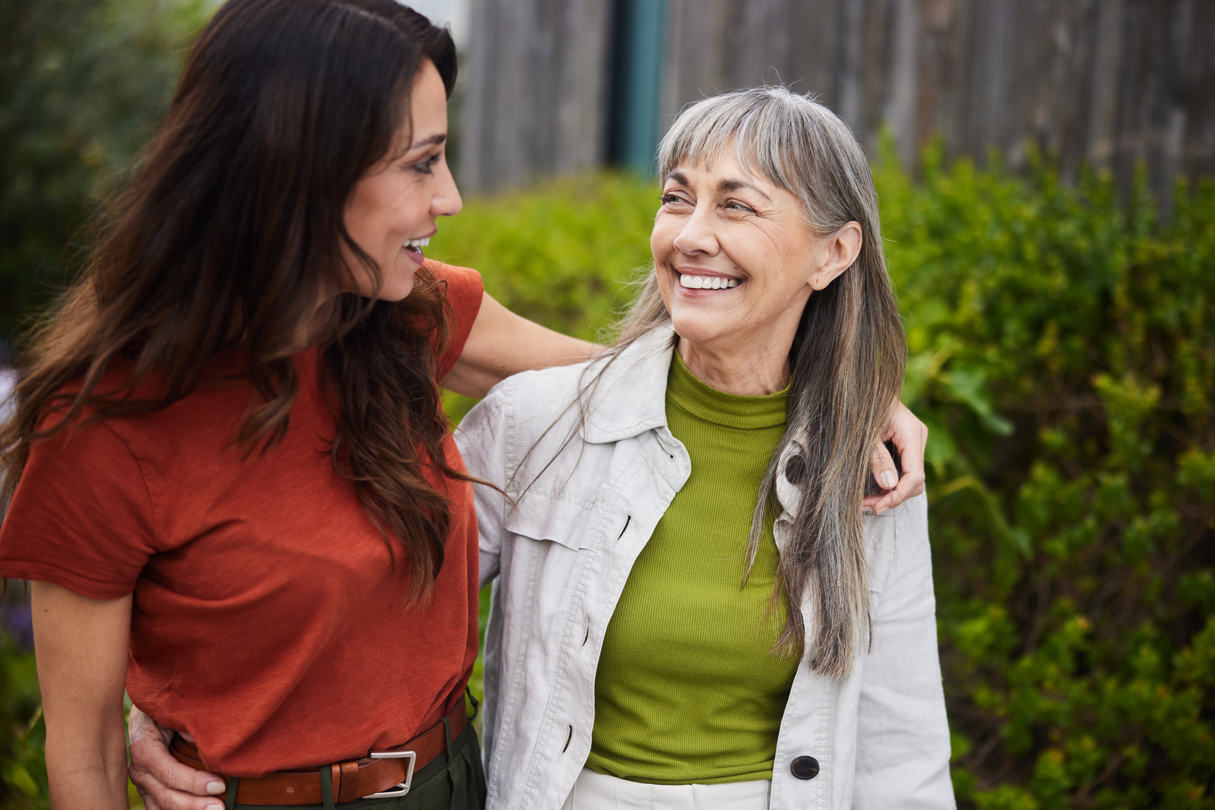 mother and daughter smiling at each other
