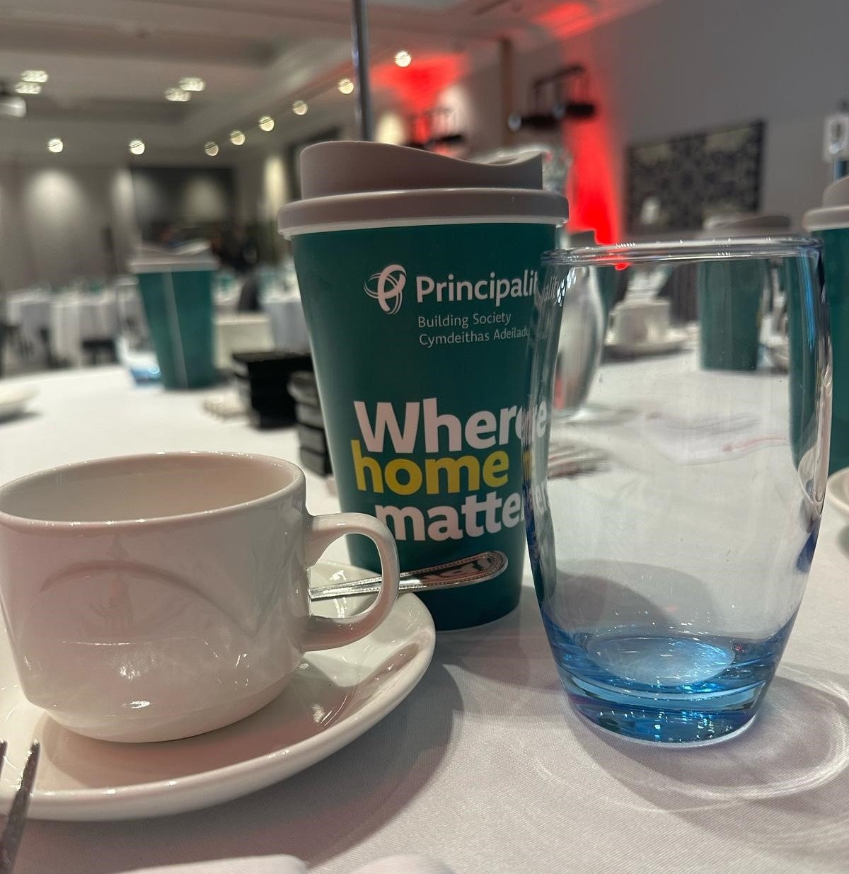 A table with a reusable Principality cup