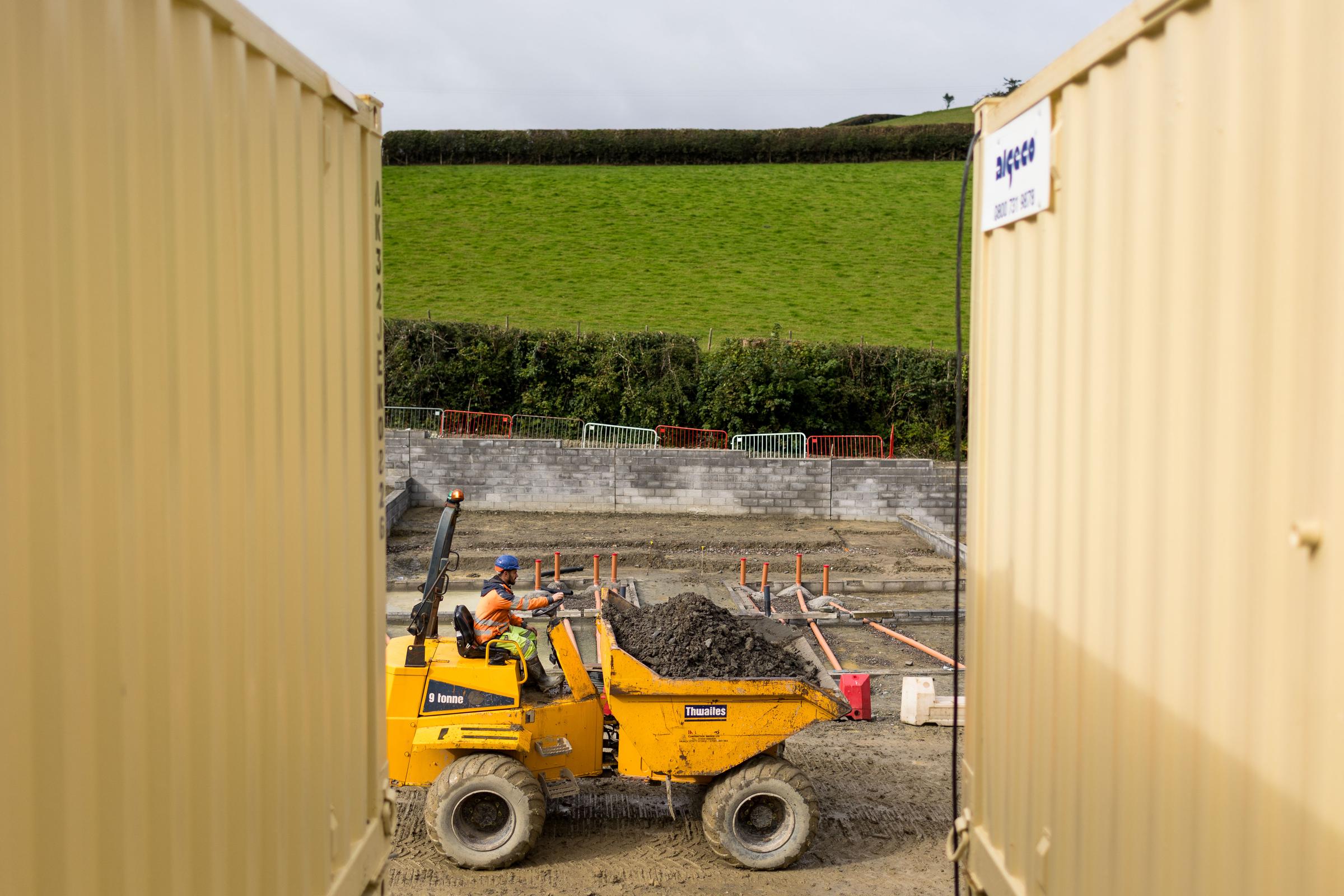 Builder driving truck of soil