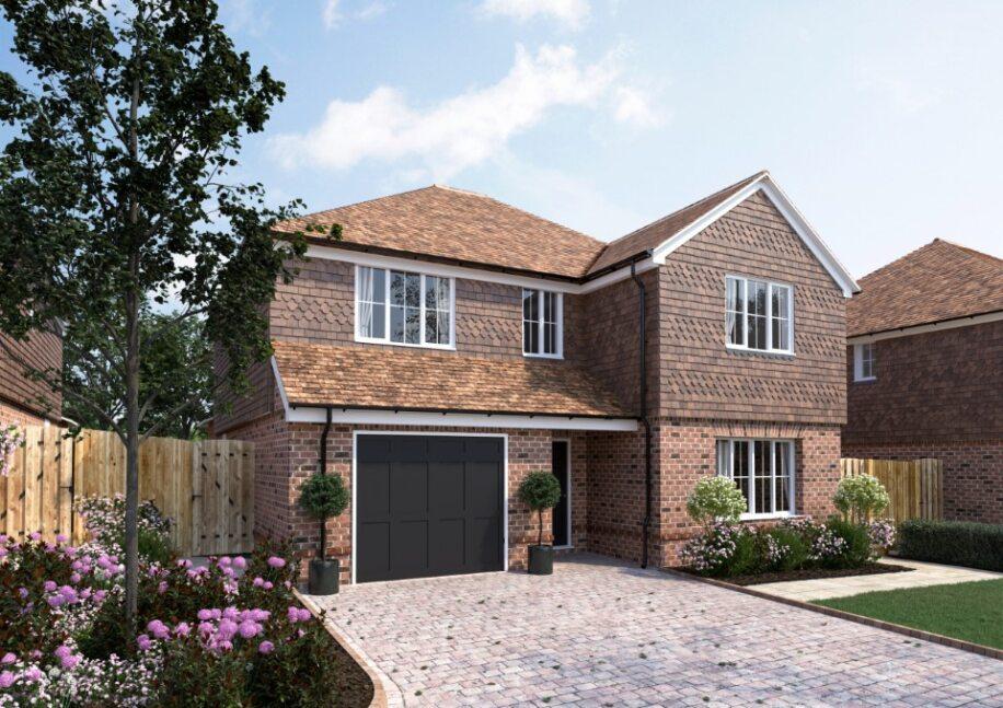 Detached house with garage and flower bed
