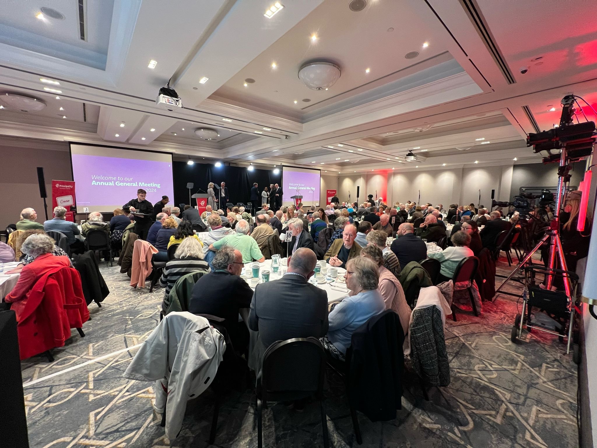 2024 AGM with guests sat at tables