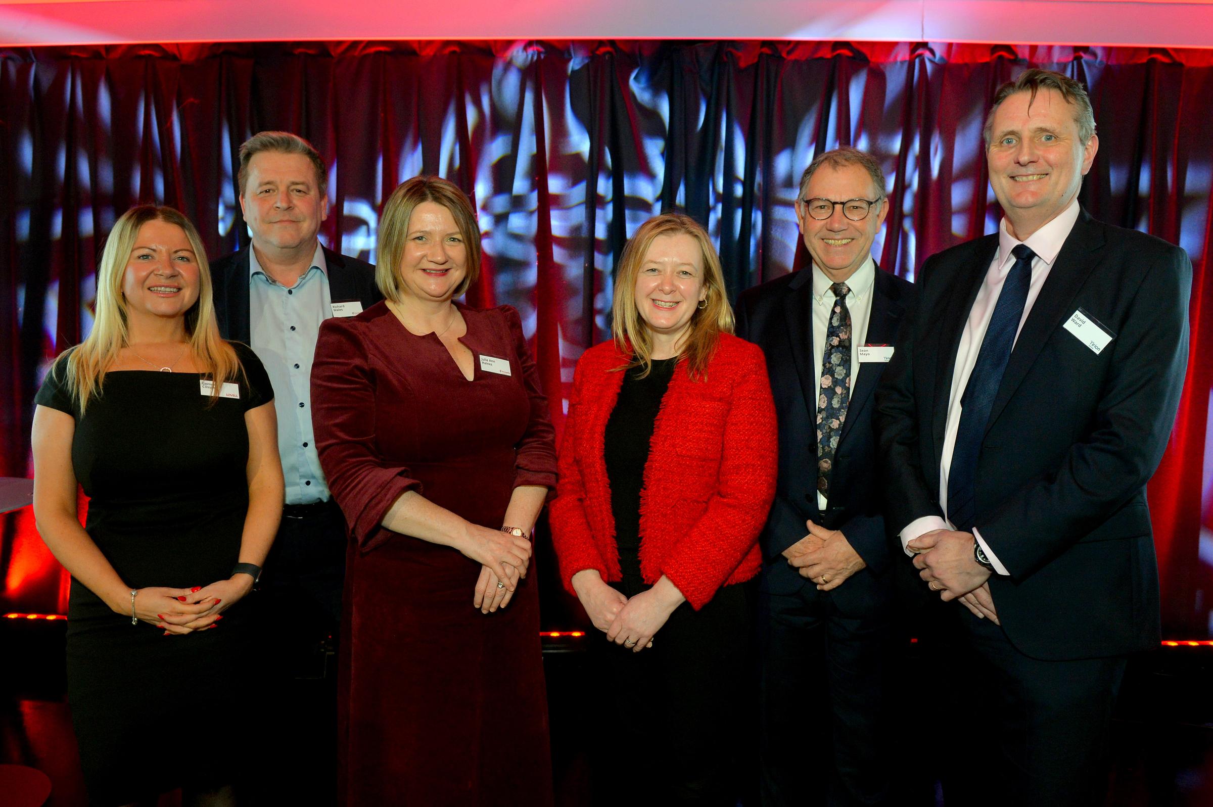 Partners of The Mill celebration posing for a photo at The Mill celebration event