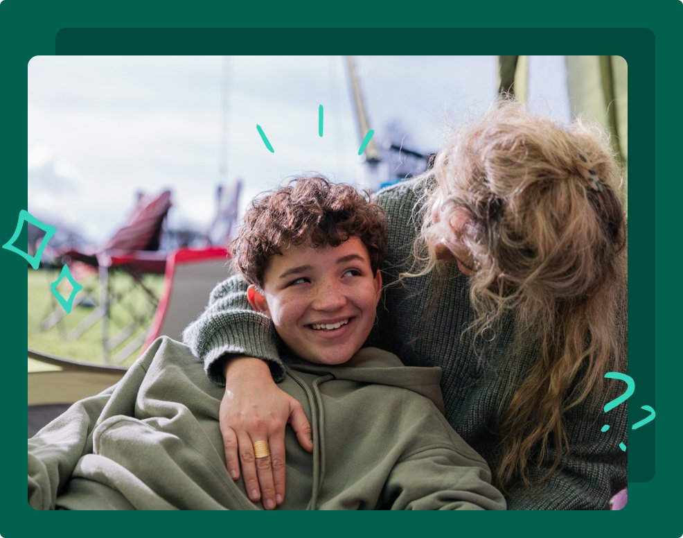 A moth looks down at her son, while out on a camping trp.