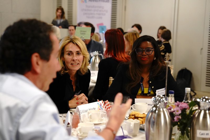 Staff at Anna Freud having a discussion during the Patron's visit.