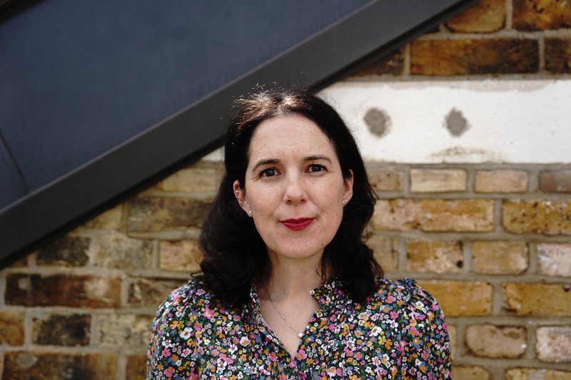 Jamie Smith MBE, Director of Schools at Anna Freud, facing the camera, smiling.