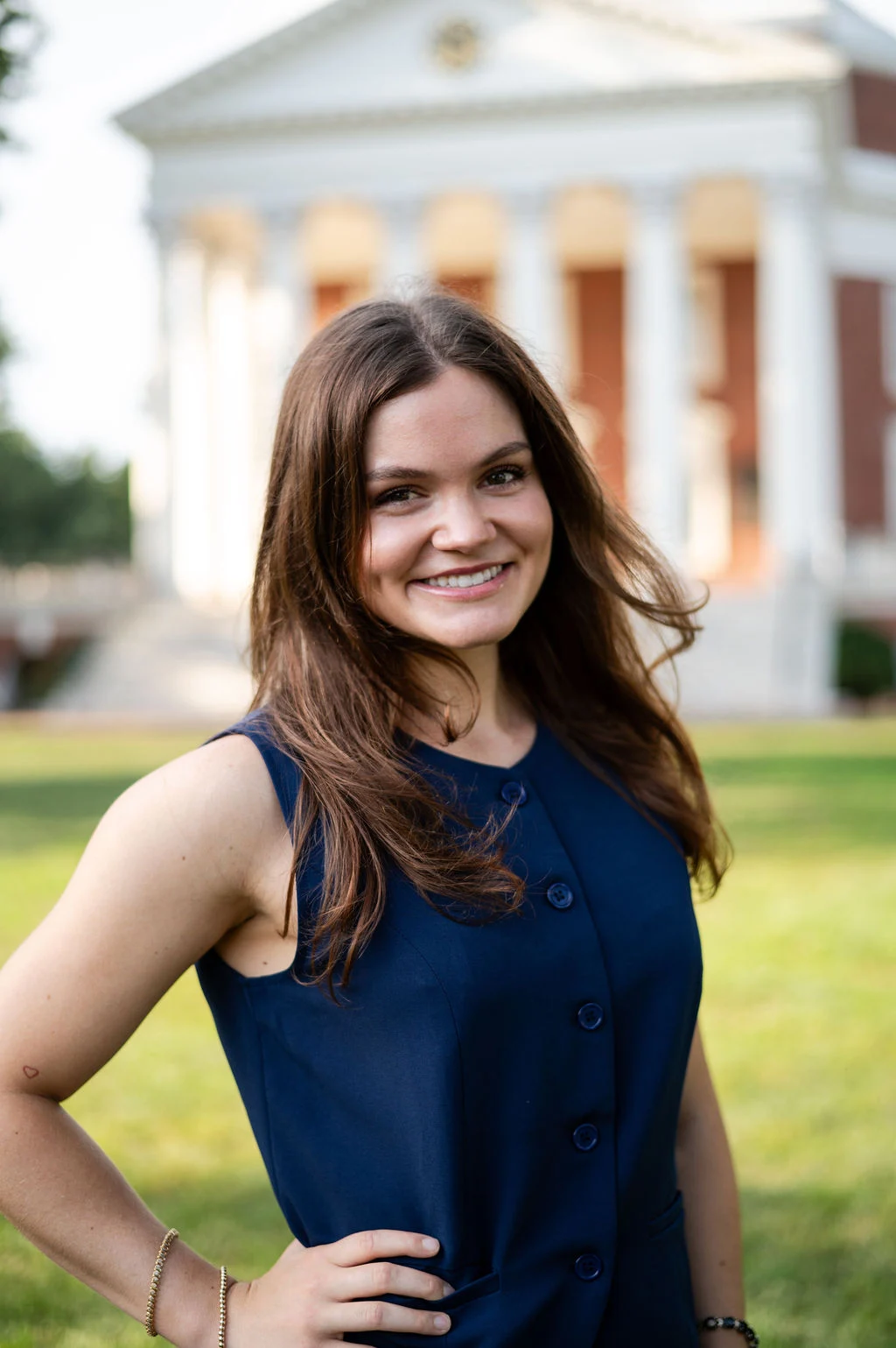 Savannah Savage, a pharmacy resident, poses in front of the rotunda at UVA 