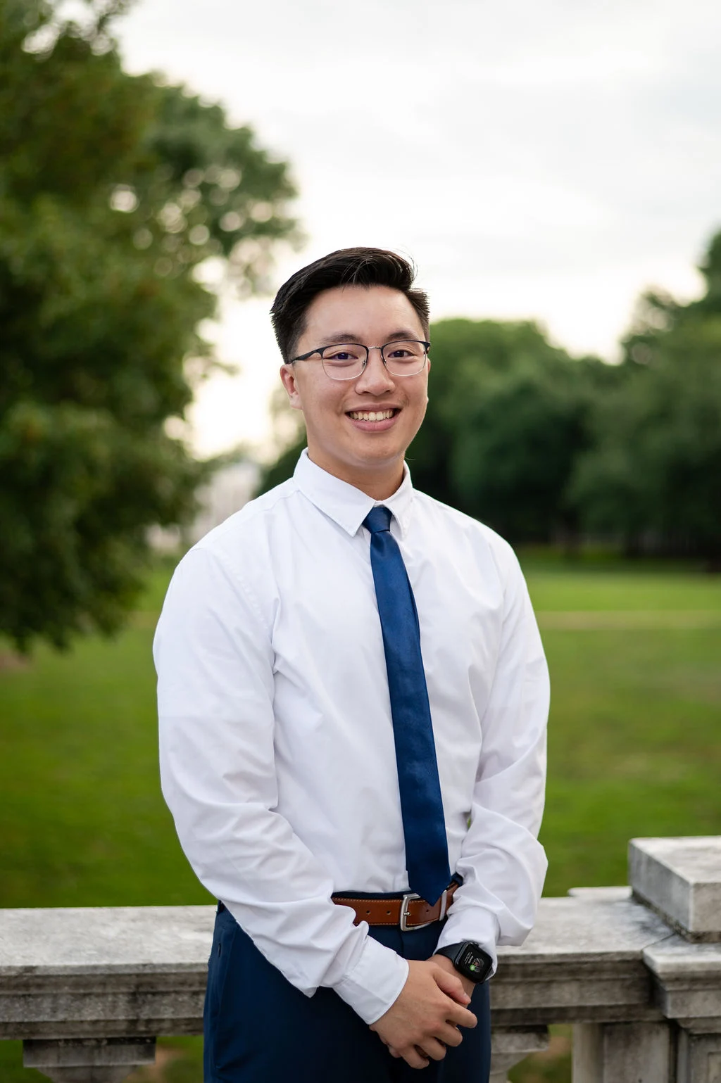 Brandon Ho, a pharmacy resident, poses on UVA Grounds