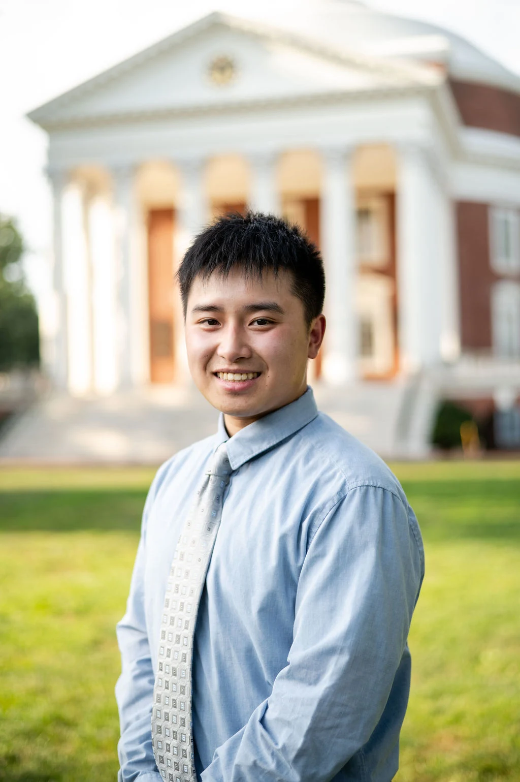 Justin Chan, a Pharmacy Community-Based Pharmacy resident poses in front of the UVA Rotunda