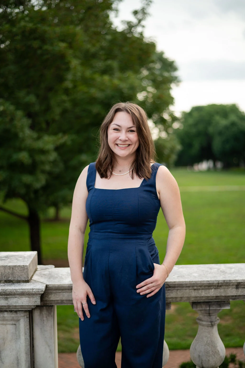 Kyndal Lemelin, a pharmacy resident, poses on the grounds at UVA