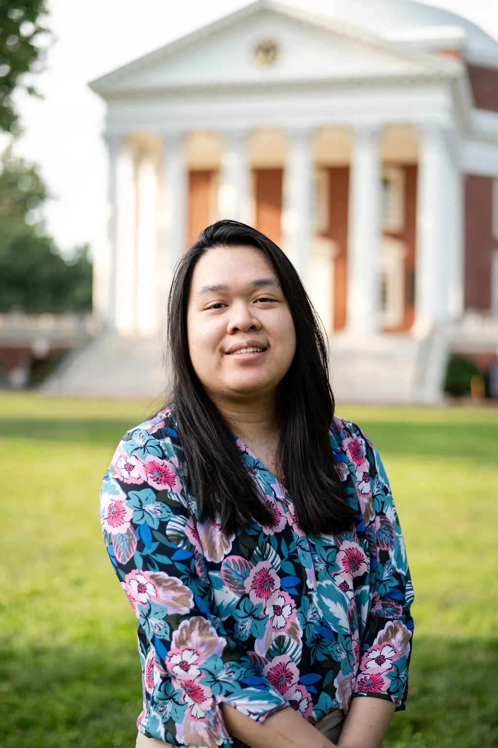 Pharmacy informatics resident Ysabell Ong poses in front of the rotunda at UVA