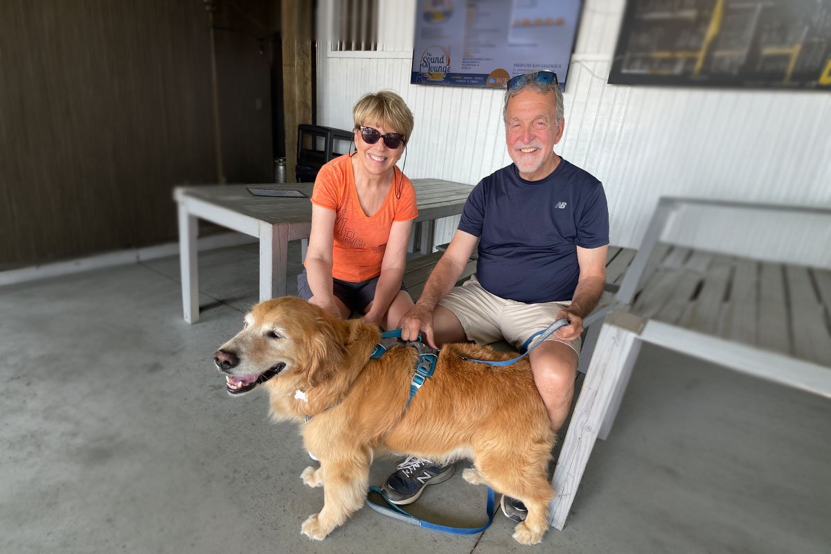 Susan and Jim pose with their dog