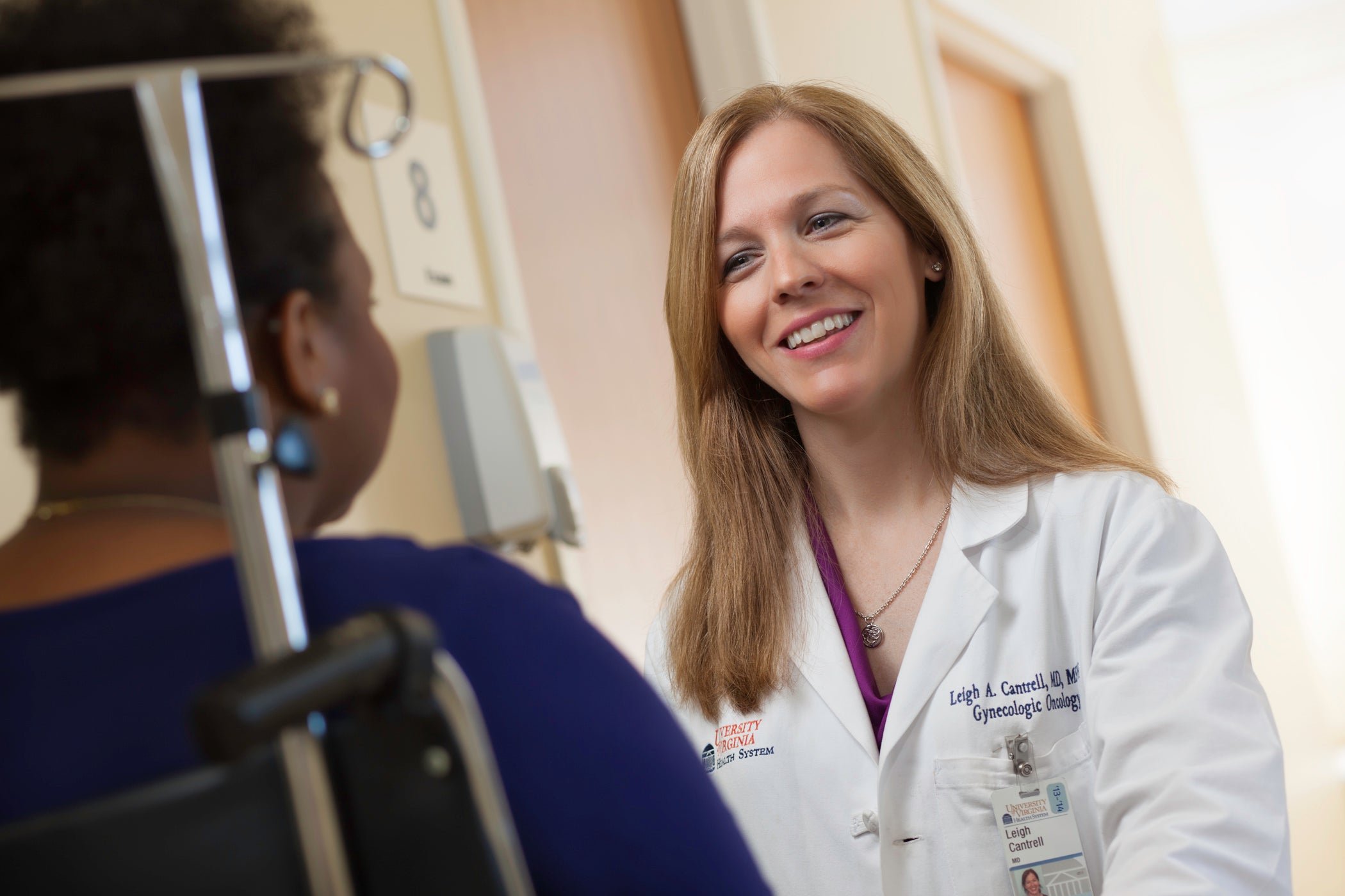 A patient talking with her doctor