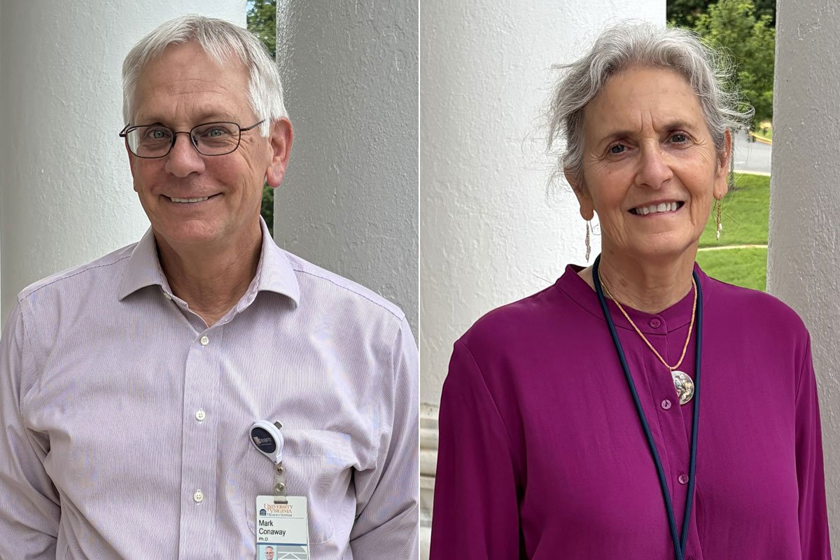 Mark Conaway and Gina Petroni stand outside smiling at the camera.