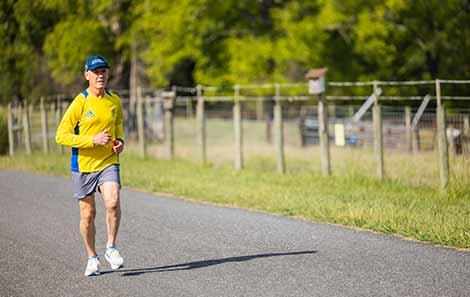Harry running on a roadoutside