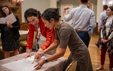 Participants in the Health Leadership Institute working together