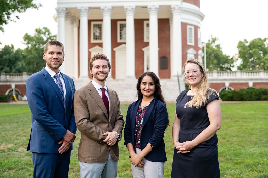 4 Pharmacy residents stand in front of the historic rotunda on UVA grounds