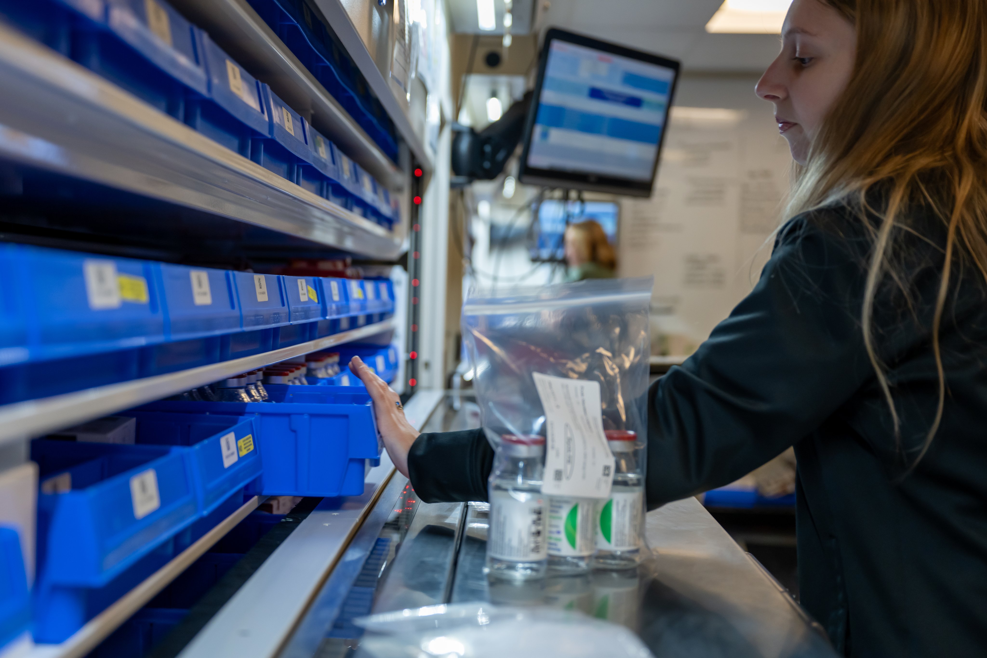 pharmacist selects the right medication 
