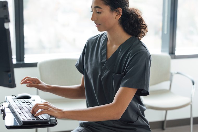 Clinician using a computer