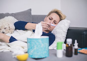 Photo of a person checking a flu test.