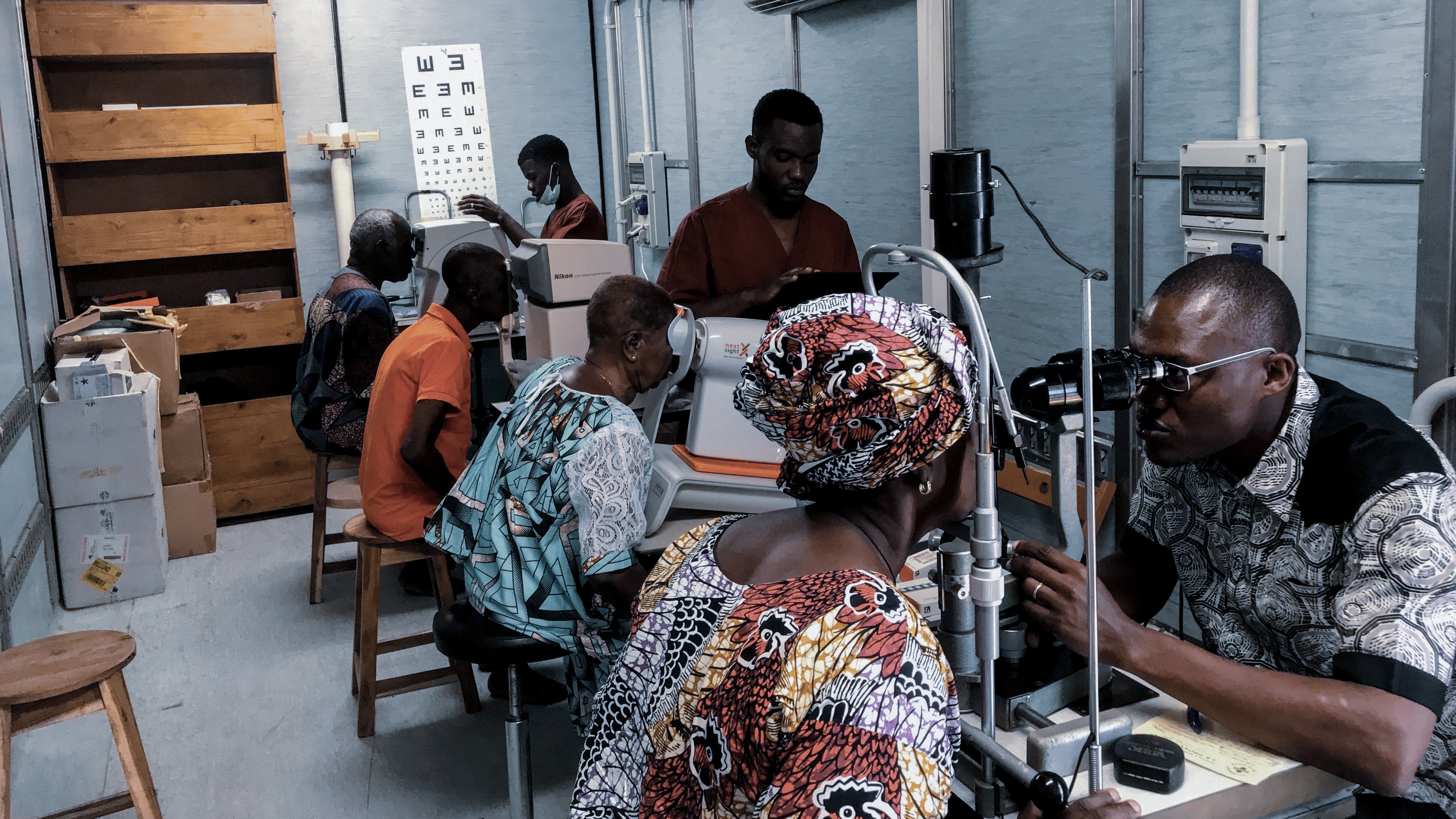 Eye care team examining patients during a Soleil d’Afrique ophthalmic outreach programme