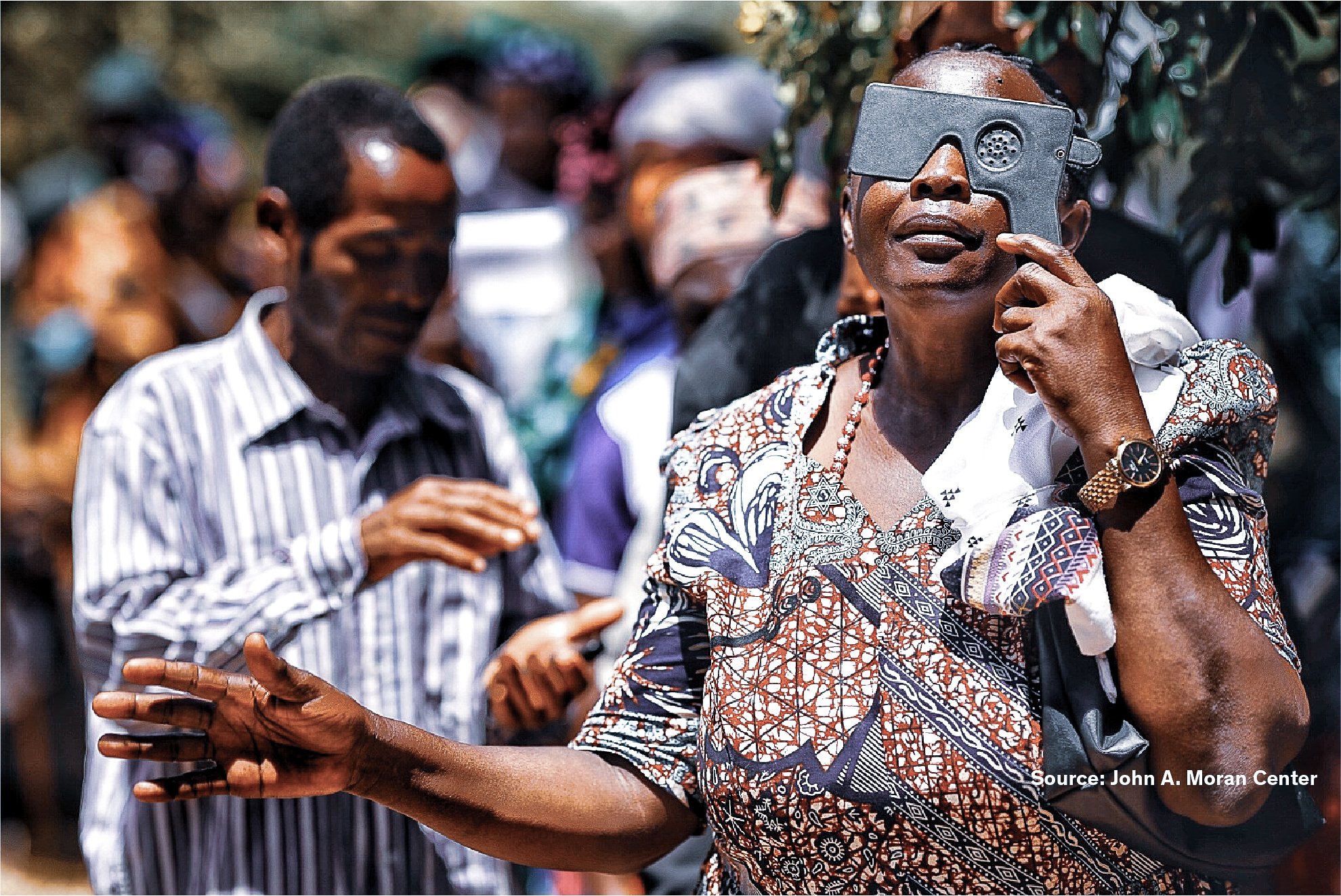 Participant undergoing a vision screening during a community eye health outreach programme supported by the Moran Eye Center