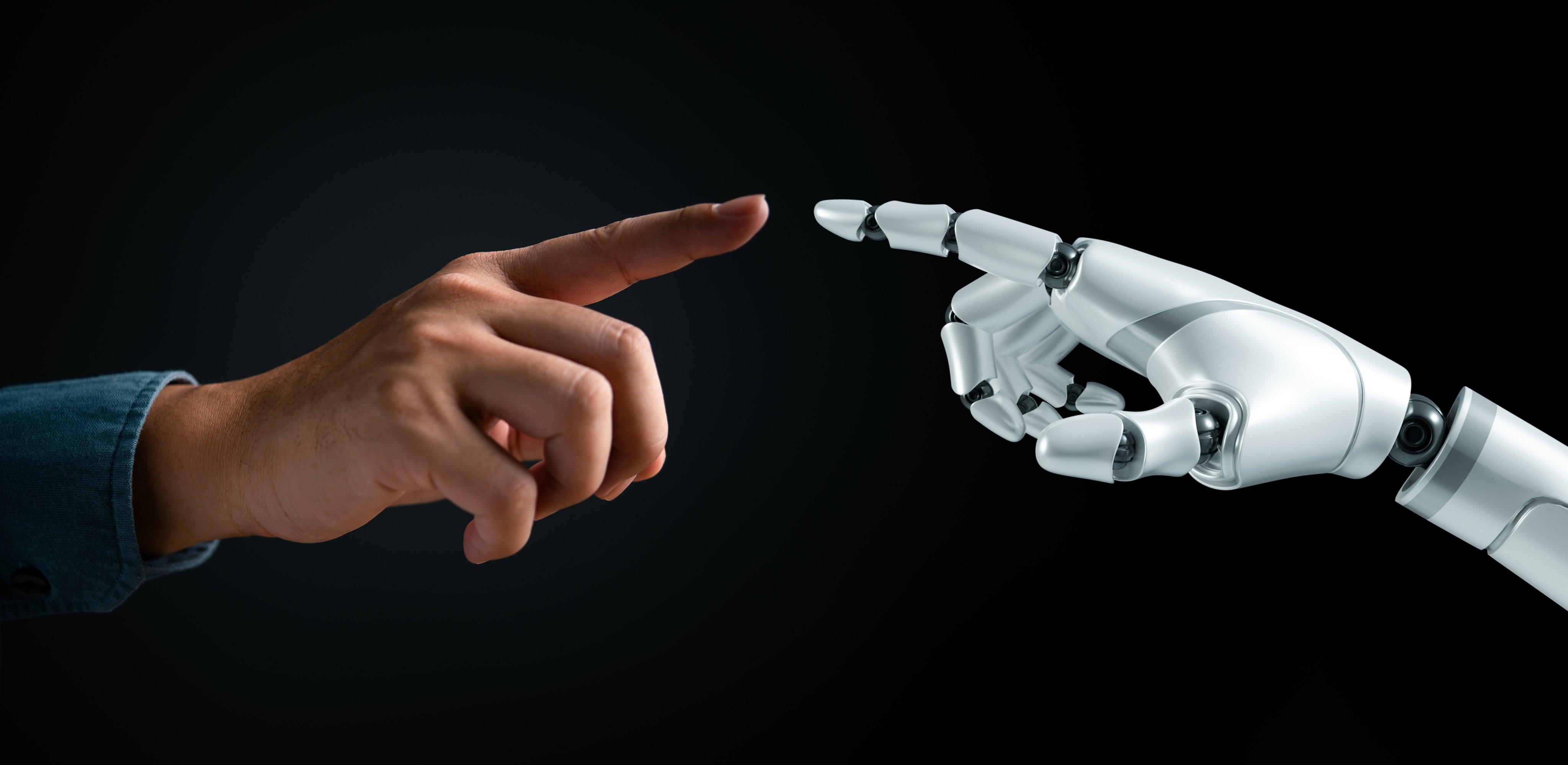 Human and robot hands reaching out to touch. Symbolizes human-AI interaction, futuristic cooperation. Technology and innovation concept. Cybernetic partnership
