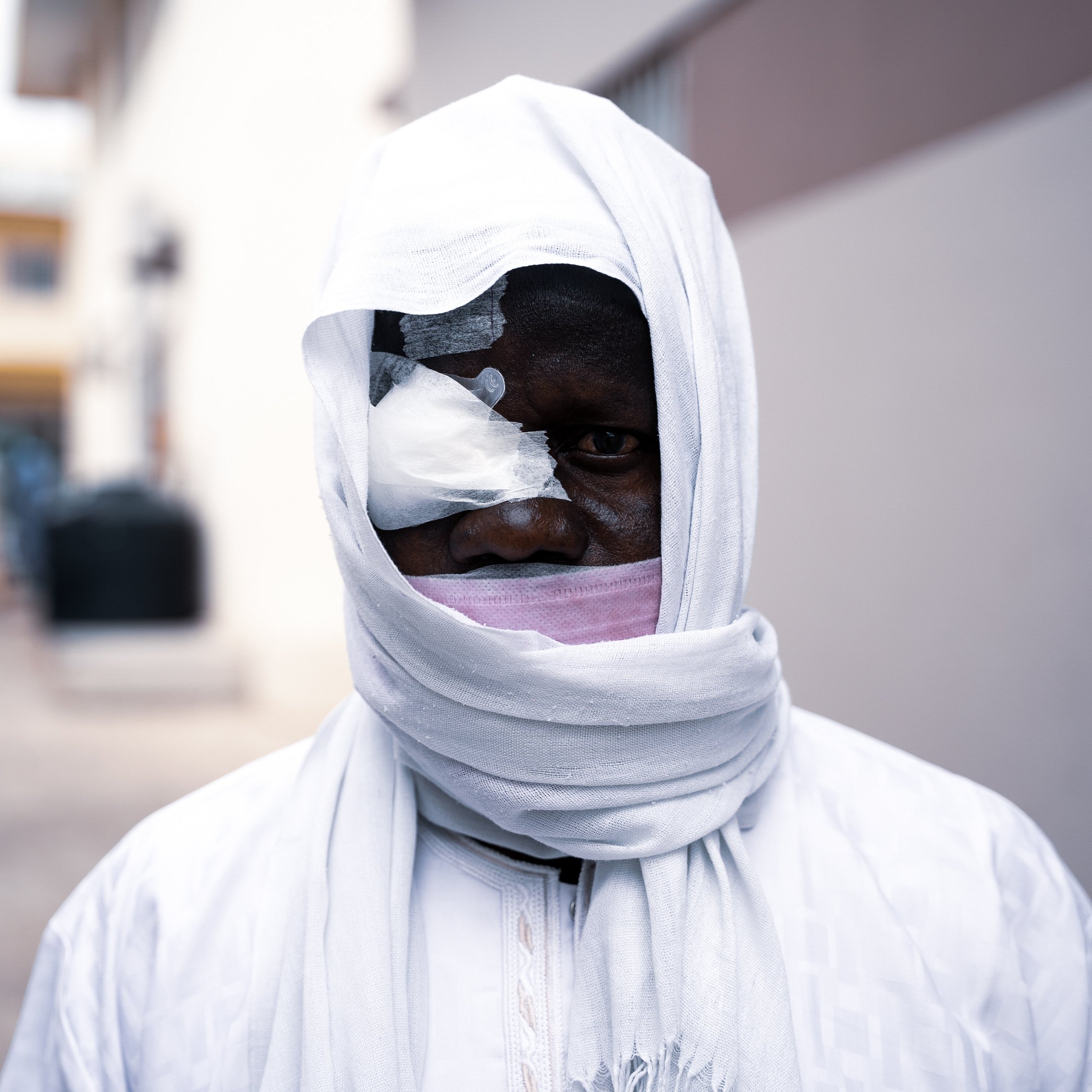 Patient with an eye bandage after cataract surgery during a Fundación Elena Barraquer charity mission